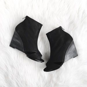 Pelle Moda | modern lasercut leather wedge booties